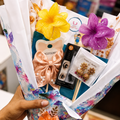 Colorful Beauty & Jewellery Gift Bouquet – Pink Bow & Flower Hamper